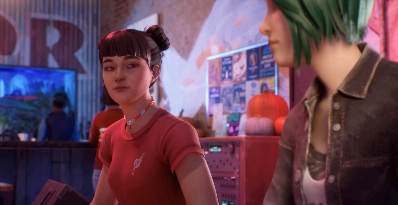 Две девушки разговаривают в уютной комнате с неоновым освещением, у одной зеленые волосы, а у другой черные, собранные в пучок